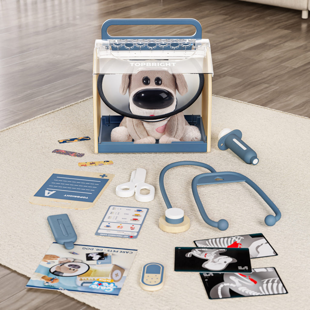 Set vétérinaire enfant avec chien peluche interactif et ses accessoires étalés sur une table